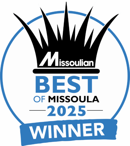 Dayspring Restoration team celebrating Best of Missoula award win, smiling and holding the award plaque, representing excellence in restoration services."